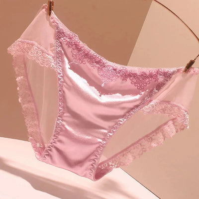 Light pink satin panties with tonal embroidered lace trim on hanger