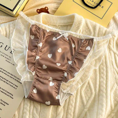 Chocolate brown satin panties with white heart print and ivory lace trim detail