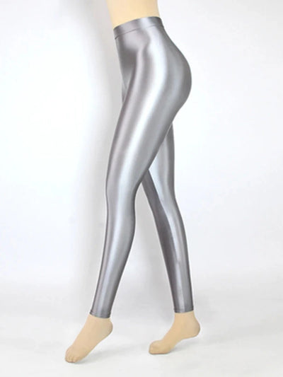 Side view of glossy high-rise silver tapered satin pants on mannequin