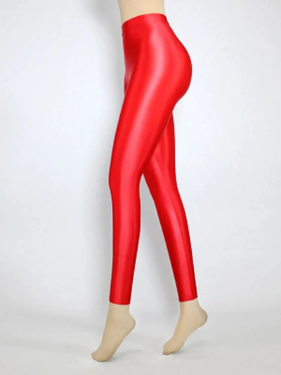 Side view of glossy high-rise red tapered satin pants on mannequin