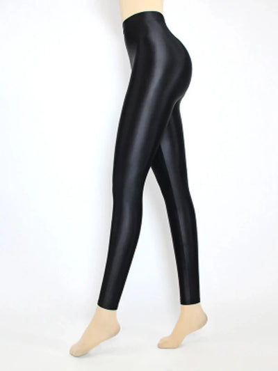 Side view of glossy high-rise black tapered satin pants on mannequin
