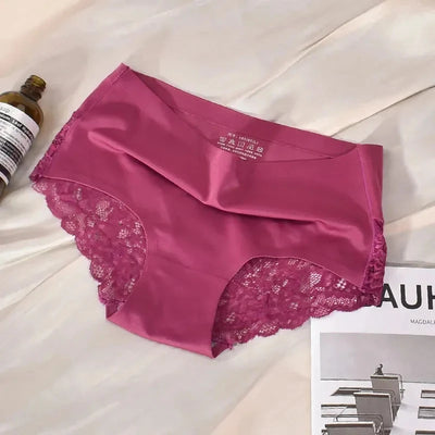 Rose red mid-rise satin panties with wide floral lace trim, care label visible on fabric