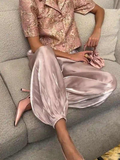 Blush satin balloon pants paired with pink gold jacquard blazer and blush pointed heels