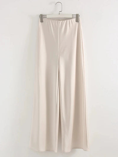Champagne flared satin pants flat lay on hanger showing full length silhouette