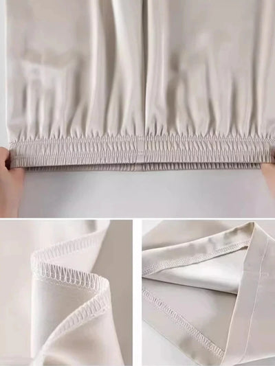 Detail shots of elasticized hem, overlock inseam, and fabric finish on beige satin wide-leg pants
