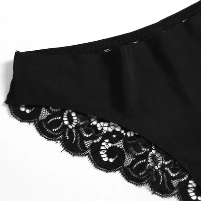 Close-up of scalloped floral lace hem and smooth satin waistband on black panty