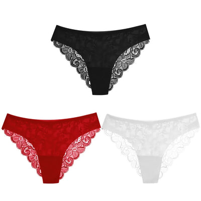 Three satin lace-trim panties in black, red and white laid out on white background