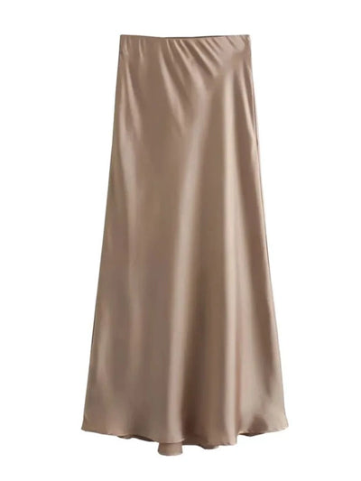 Champagne satin bias-cut midi skirt flat lay on white background with fluid A-line drape