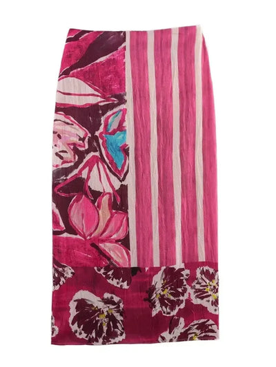 Flat lay of a pink floral and stripe mixed-print midi skirt with hem border detail
