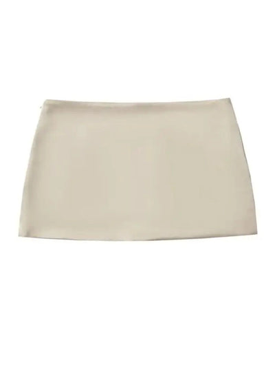 Flat lay of cream low-rise satin mini skirt on white background