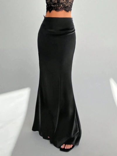 Front view of a black mermaid-cut maxi satin skirt with a flat waistband and flared floor-length hem