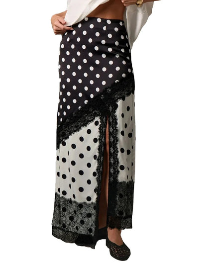 Side view of two-tone polka dot satin maxi skirt with diagonal lace trim on white background
