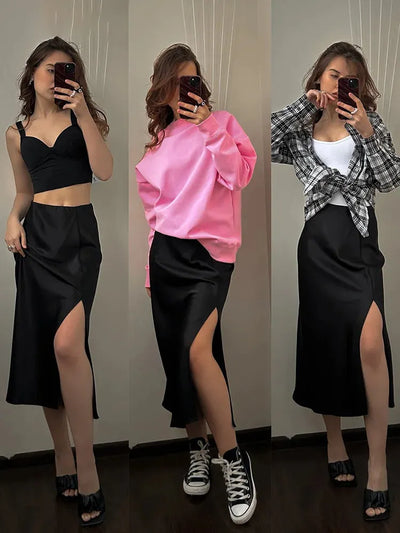 Three outfit pairings with black satin midi skirt, bra top, pink sweatshirt, and plaid shirt