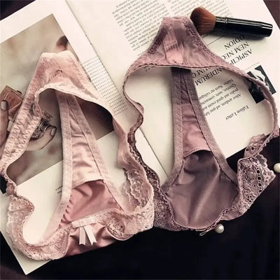 Two pink and mauve satin thong panties shown open from inside, displaying interior gusset lining