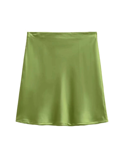 Flat lay of olive green satin mini skirt showing full A-line silhouette on white background