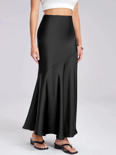Black satin bias-cut mermaid maxi skirt paired with white crop top, front view