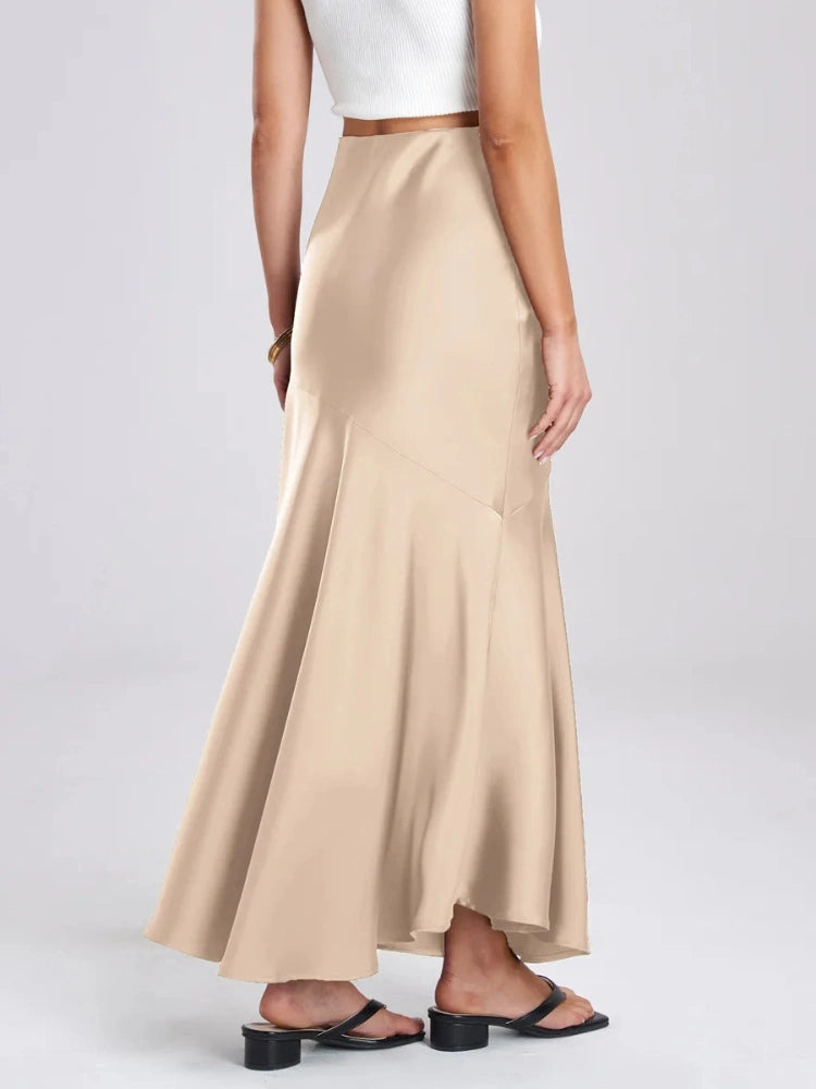 Black satin bias-cut mermaid maxi skirt paired with white crop top, front view
