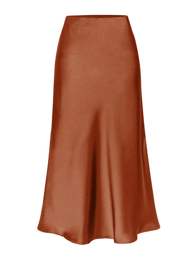 Flat lay of rust brown high-waist satin midi skirt with A-line silhouette