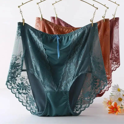 Four floral lace satin panties in teal, rust, pink, and burgundy hanging on gold clips