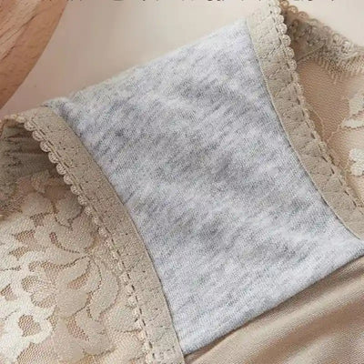 Close-up of gray cotton-knit gusset lining inside a beige lace satin panty