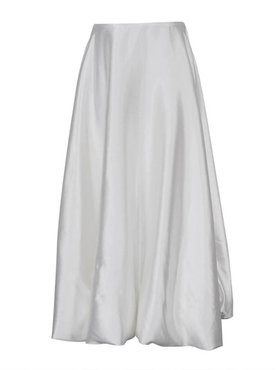 Flat lay product shot of ivory A-line satin maxi skirt on white background showing full silhouette