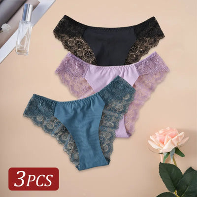 Three lace-side bikini panties in black, lavender, and teal, front flat-lay view