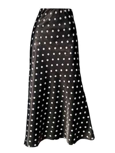 Flat lay of black and white polka dot mermaid maxi skirt on white background showing full silhouette