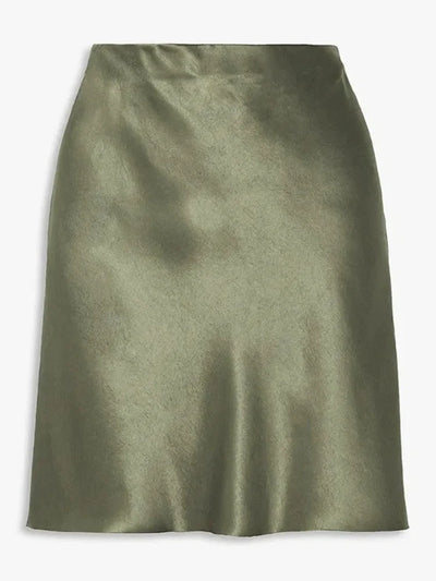 Sage green slip-style mini skirt flat lay showing fluted hem and glossy fabric finish