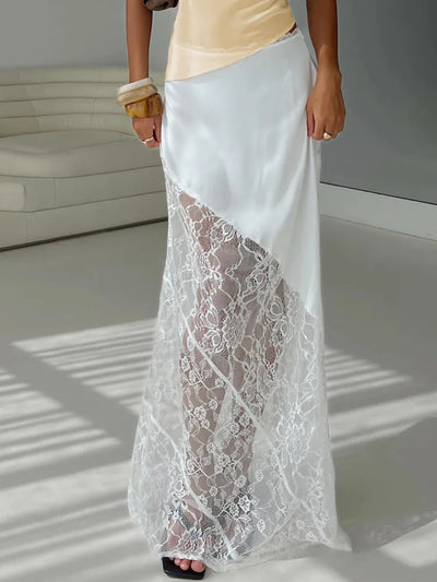 Front view of white satin and sheer lace maxi skirt with diagonal panel seam, floor length