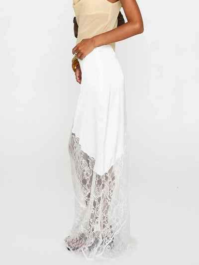 Side profile of white satin maxi skirt with sheer lace hem panel and low-rise waistband