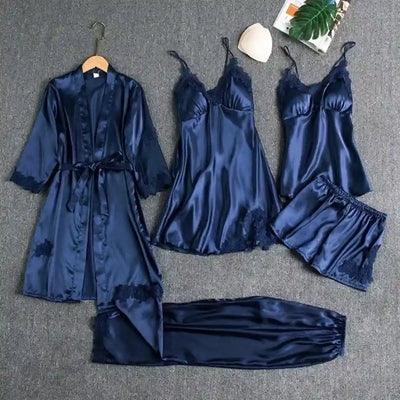 Navy blue satin five-piece pajama set with lace trim robe nightdress cami shorts and pants flat lay