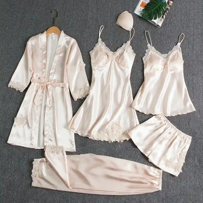 Champagne satin five-piece pajama set with lace trim robe nightdress cami shorts and pants flat lay