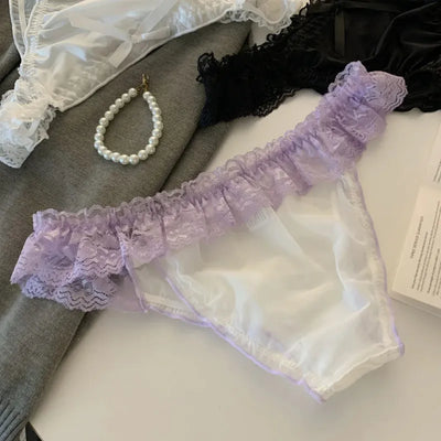 Lavender lace-trim satin panties with purple ruffle waistband and bow front flat lay