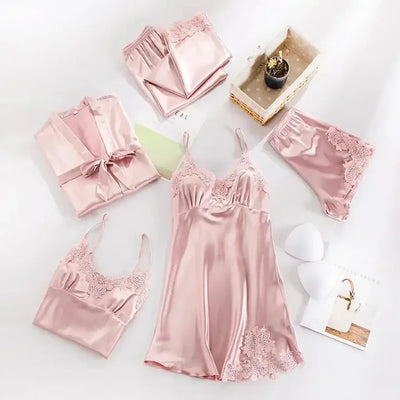 Pink satin five-piece pajama set with lace-trimmed slip dress and belted robe