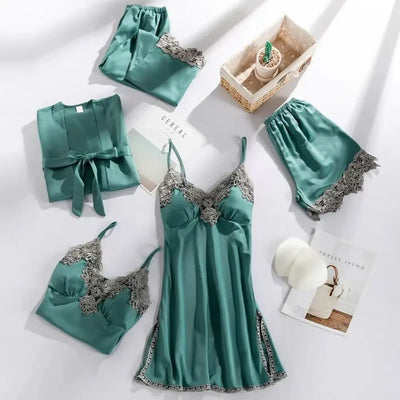 Sage green satin five-piece pajama set with gray scalloped lace trim flat lay