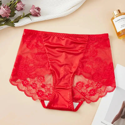 Flat lay of red satin center panties with full floral lace overlay and scalloped hem