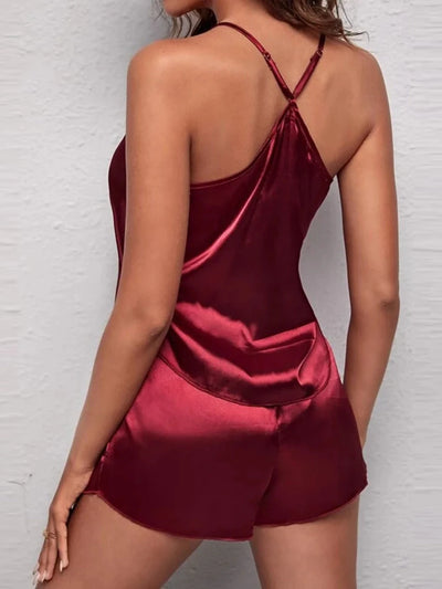 Back view showing crossback adjustable straps of burgundy satin cami pajama set