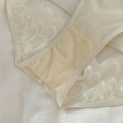 Inside view of ivory lace panties showing cotton gusset and satin lining detail