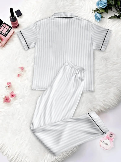 Gray striped satin pajama set back view showing notched collar top and full-length elastic waist pants