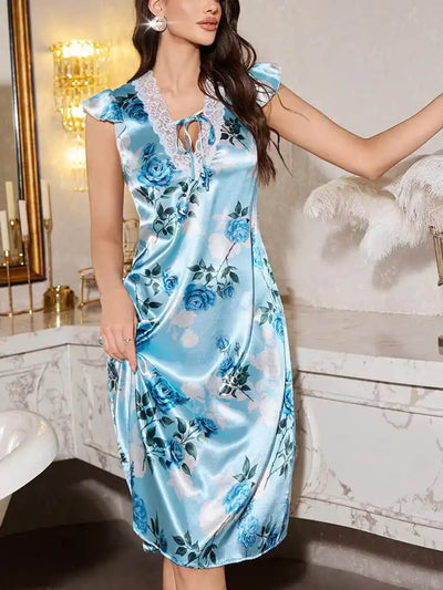 Front view of sky blue rose-print satin midi sleepwear dress with lace trim neckline and flutter sleeves