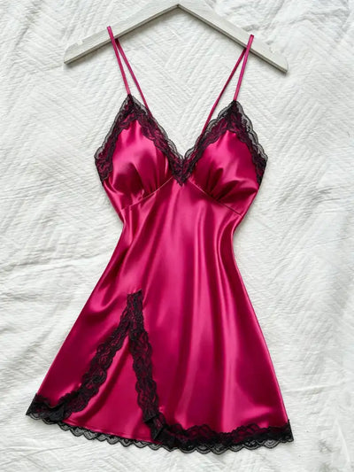 Hot pink satin mini nightgown on hanger showing full front silhouette with black lace trim details