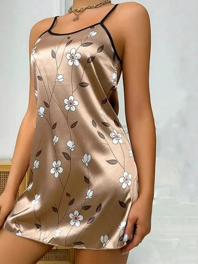 Full-length view of champagne floral satin nightgown with scoop neckline and black contrast trim