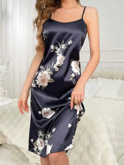 Front view of navy satin slip nightgown with blush and ivory rose print, midi length