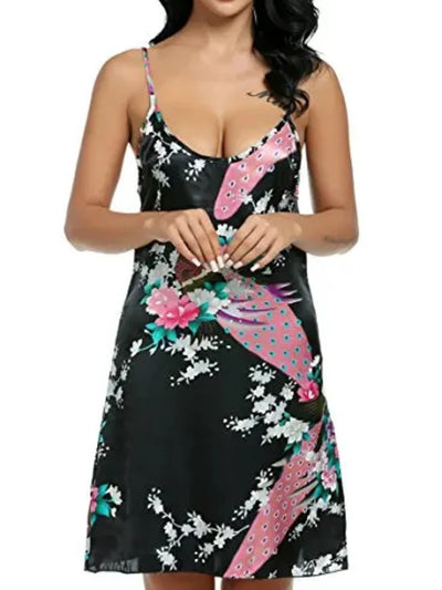 Front view of black peacock print satin nightgown with adjustable spaghetti straps