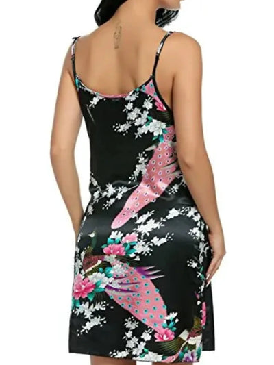 Back view of black satin nightgown with peacock print and low open back detail