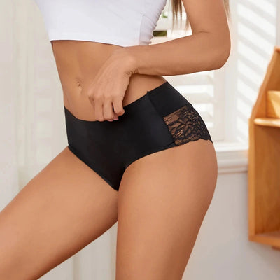 Woman wearing black satin mid-rise panties with floral lace side panel detail