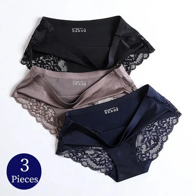 Three satin panties with lace trim folded flat in black, navy, and taupe colorways