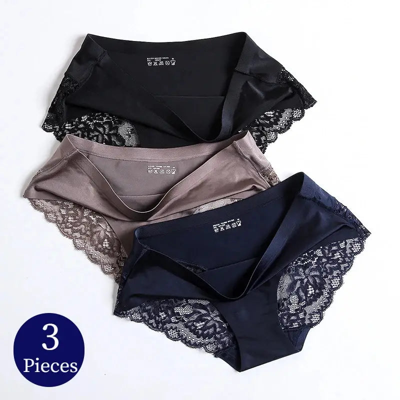 Woman wearing black satin mid-rise panties with floral lace side panel detail