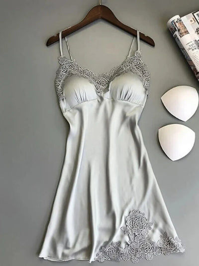Gray satin slip nightgown with floral lace V-neckline and hem trim on wooden hanger