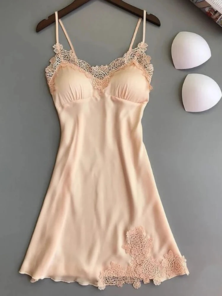 Champagne satin mini nightgown with V-neck lace trim and rose hem appliqués on hanger